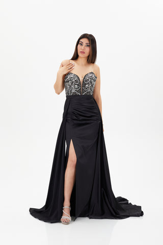 Black floor length gown with plunging neckline