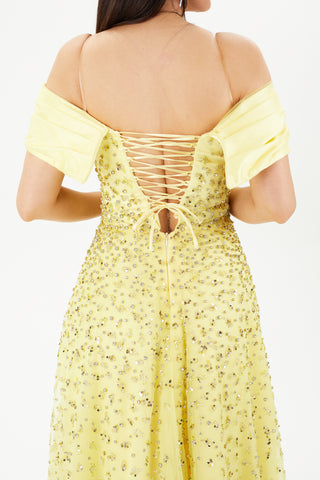 Yellow gown with spagetti strap at the back