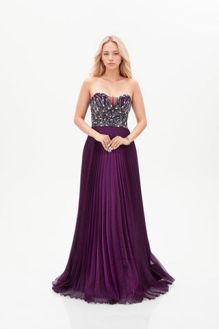 Dark magenta floor length gown with plunge neckline