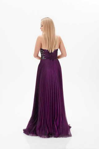 Dark magenta floor length gown with plunge neckline