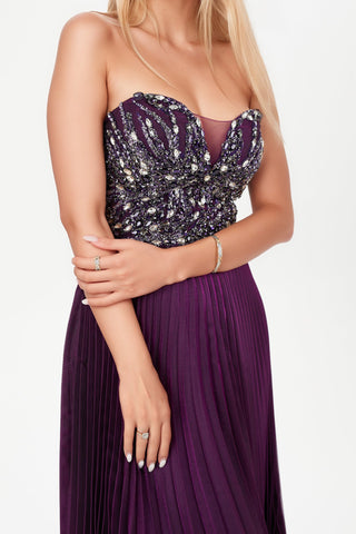 Dark magenta floor length gown with plunge neckline