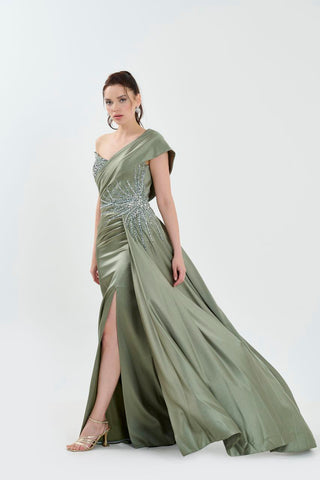 Green floor length gown with one-shoulder neckline