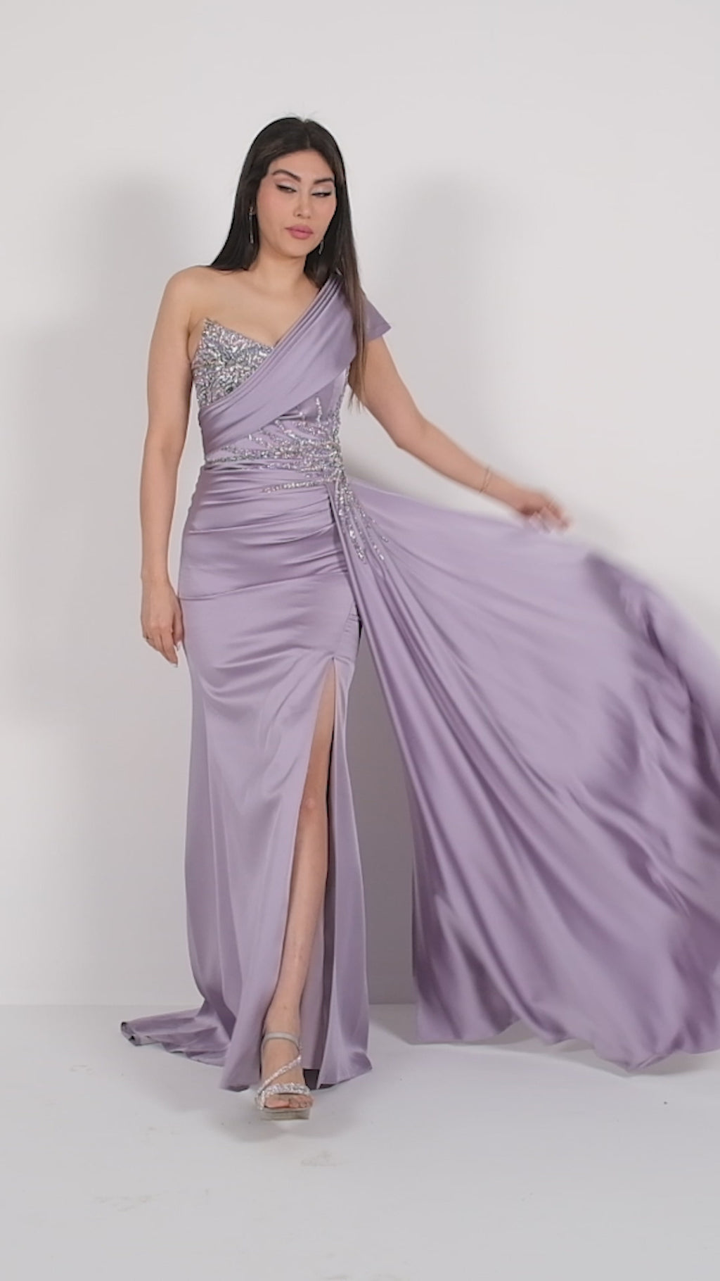 Purple floor length gown with one-shoulder neckline